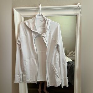 White hooded Pacifica top.